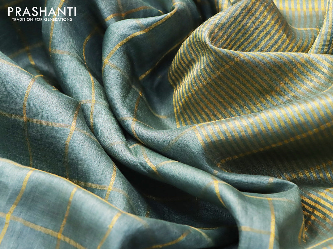 Pure tussar silk saree greyish green and teal blue with allover zari checked pattern and zari woven border and Kalamkari printed blouse