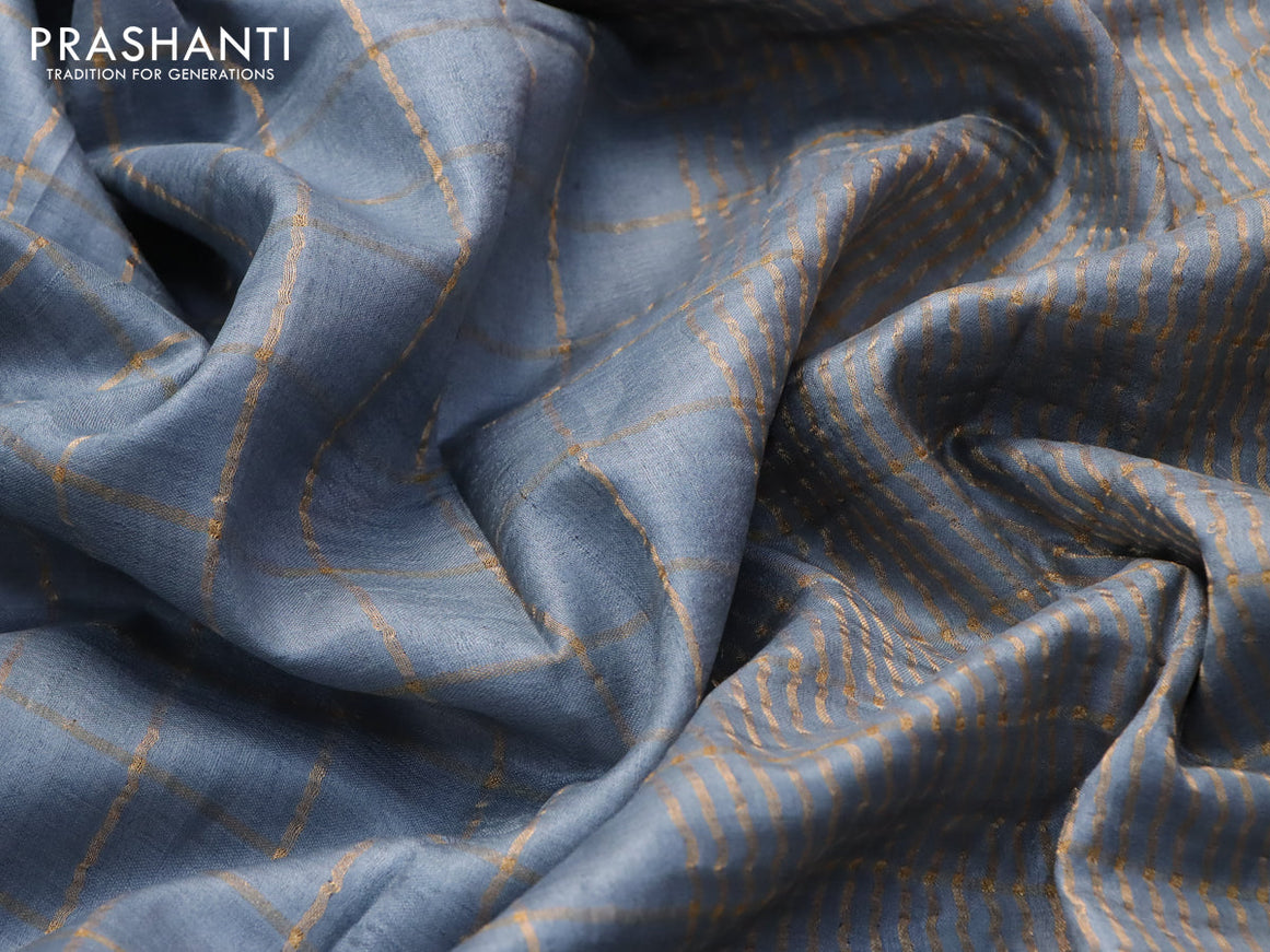 Pure tussar silk saree pastel grey and teal blue with allover zari checked pattern and zari woven border and Kalamkari printed blouse