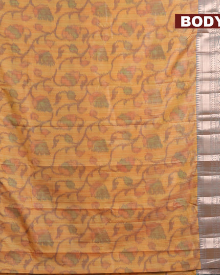 Banarasi semi tussar saree mango yellow and teal green with allover ikat weaves and long zari woven border