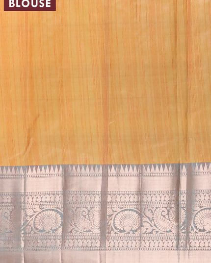 Banarasi semi tussar saree mango yellow and teal green with allover ikat weaves and long zari woven border