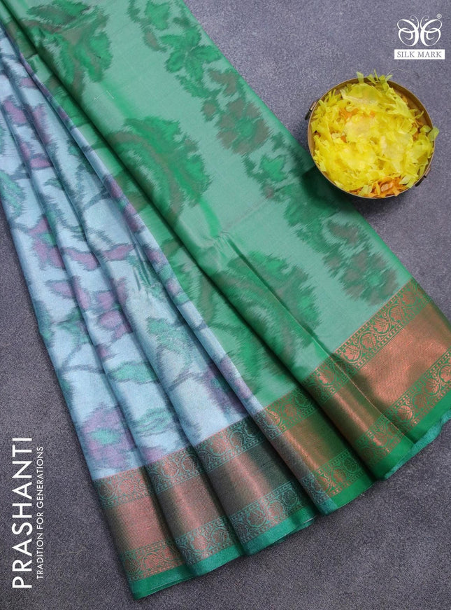 Banarasi semi tussar saree teal blue shade and green with allover ikat weaves and copper zari woven border