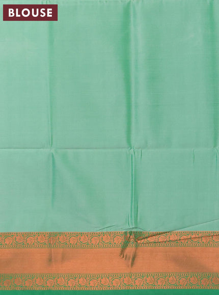 Banarasi semi tussar saree teal blue shade and green with allover ikat weaves and copper zari woven border