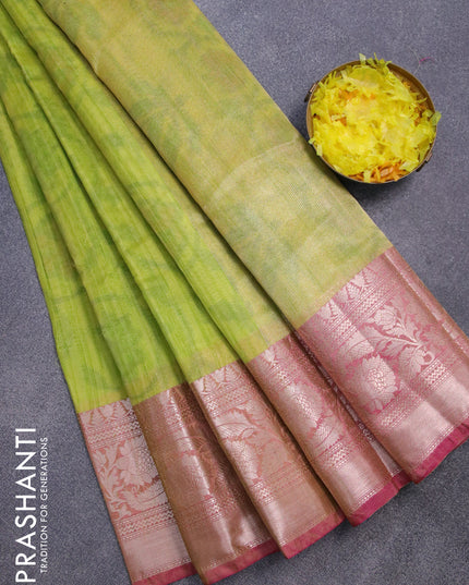 Banarasi semi tussar saree light green and magenta pink with allover ikat weaves and zari woven border