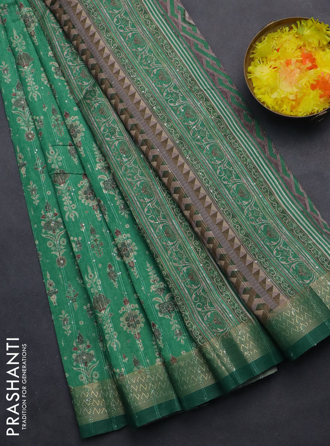 Semi tussar saree green with allover prints & sequin work and zari woven border
