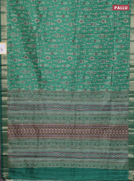 Semi tussar saree green with allover prints & sequin work and zari woven border