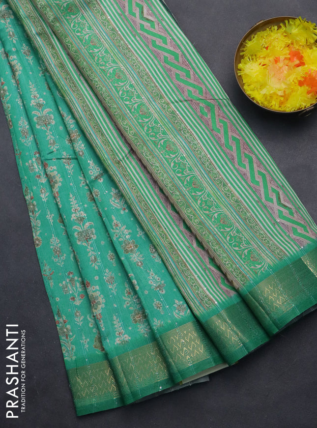 Semi tussar saree green with allover prints & sequin work and zari woven border