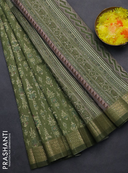 Semi tussar saree mehendi green with allover prints & sequin work and zari woven border