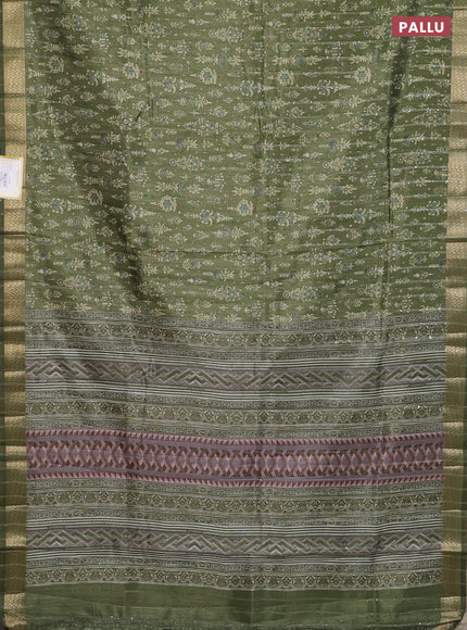 Semi tussar saree mehendi green with allover prints & sequin work and zari woven border