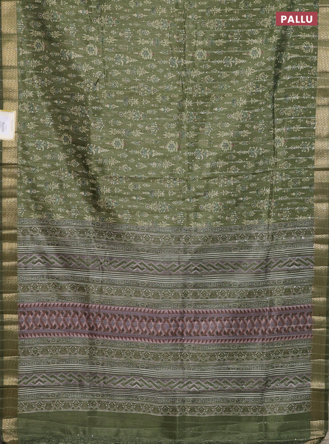 Semi tussar saree mehendi green with allover prints & sequin work and zari woven border