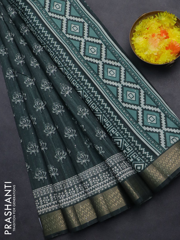 Semi tussar saree dark green with butta prints & sequin work and zari woven border
