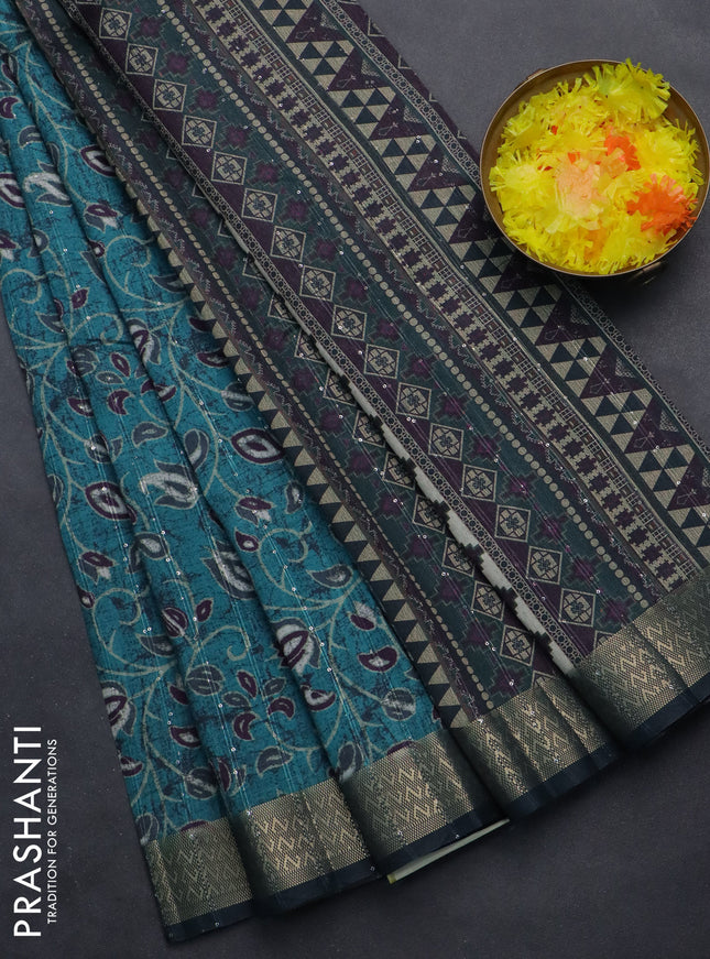 Semi tussar saree teal blue with allover prints & sequin work and zari woven border