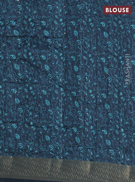 Semi tussar saree teal blue with allover prints & sequin work and zari woven border