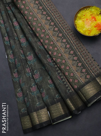 Semi tussar saree sap green and black with floral butta prints & sequin work and zari woven border