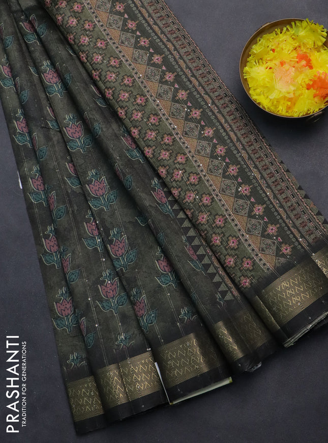 Semi tussar saree sap green and black with floral butta prints & sequin work and zari woven border