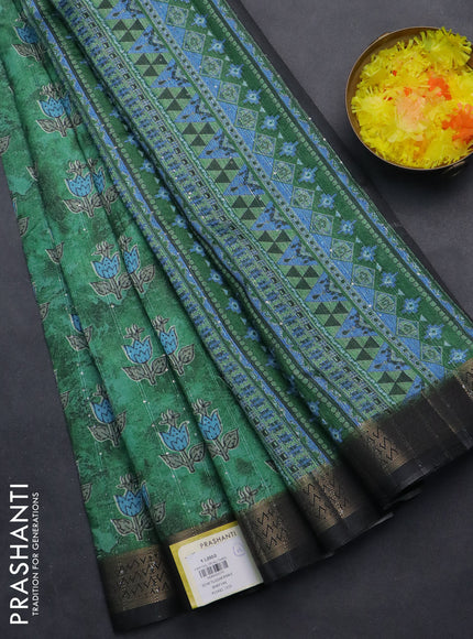 Semi tussar saree green and black with floral butta prints & sequin work and zari woven border