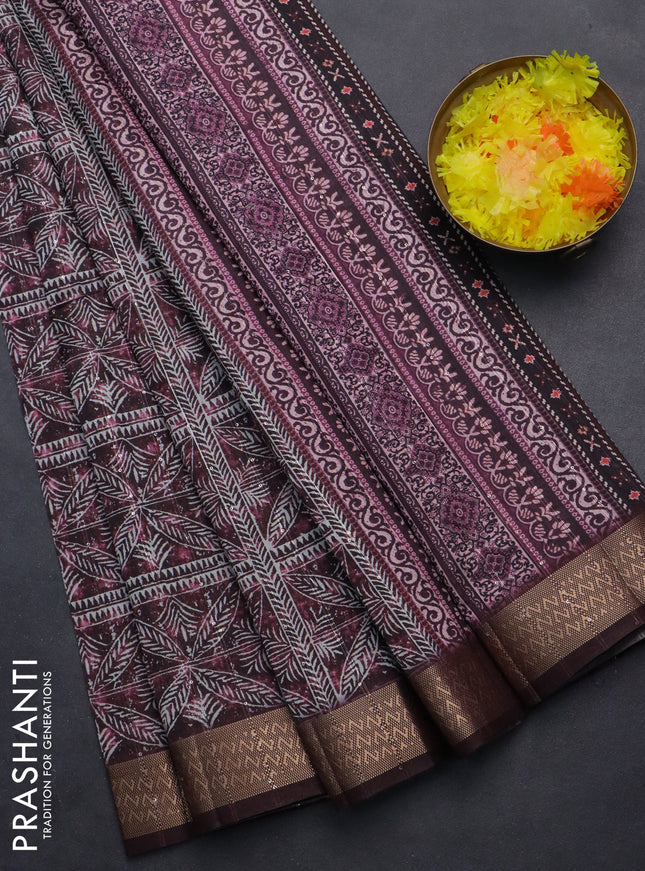 Semi tussar saree wine shade with allover leaf prints & sequin work and zari woven border