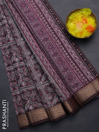 Semi tussar saree wine shade with allover leaf prints & sequin work and zari woven border