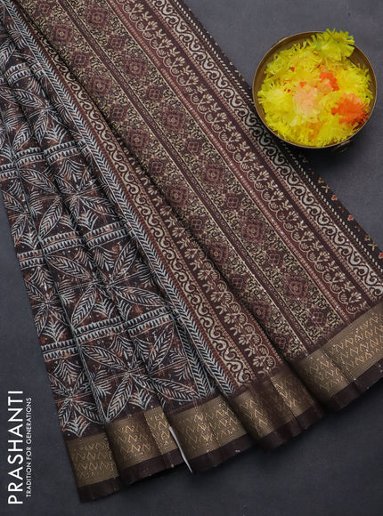Semi tussar saree brown with allover leaf prints & sequin work and zari woven border