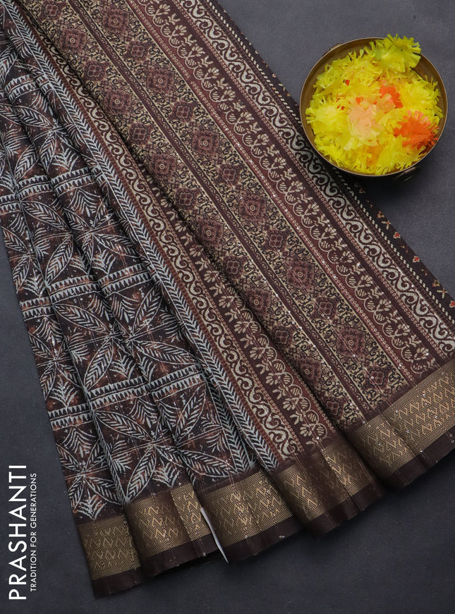 Semi tussar saree brown with allover leaf prints & sequin work and zari woven border