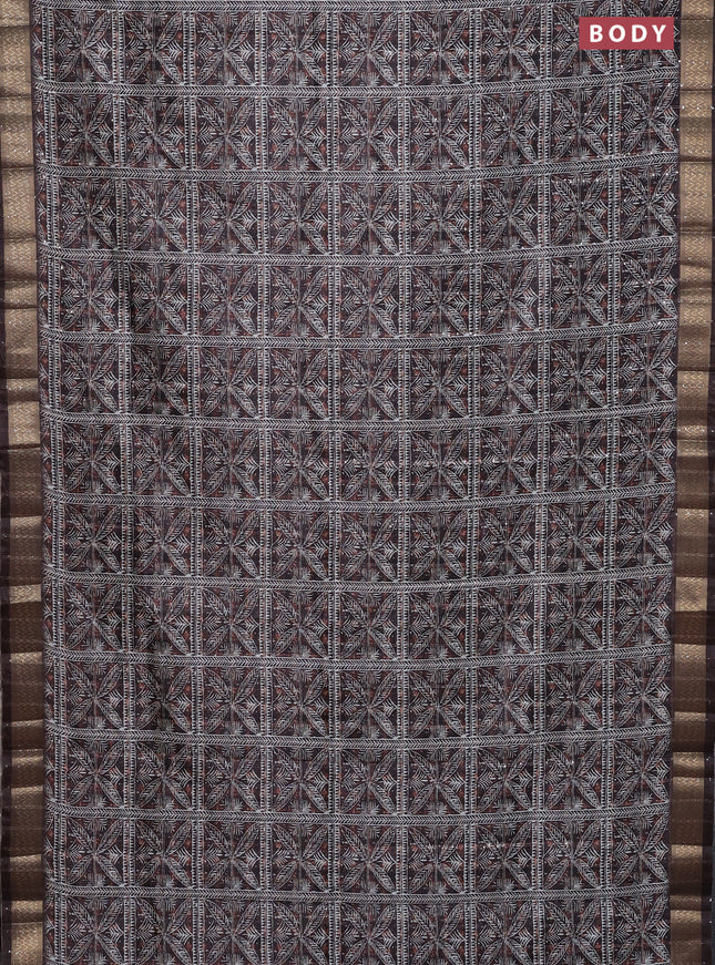 Semi tussar saree brown with allover leaf prints & sequin work and zari woven border