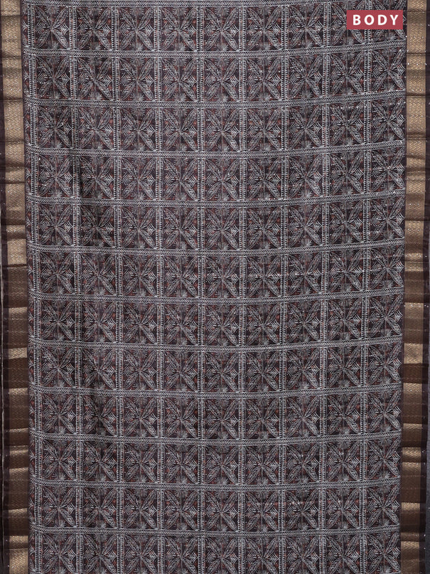 Semi tussar saree brown with allover leaf prints & sequin work and zari woven border