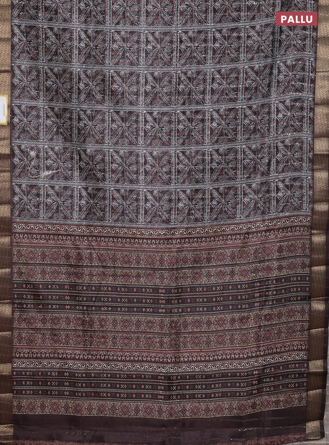 Semi tussar saree brown with allover leaf prints & sequin work and zari woven border