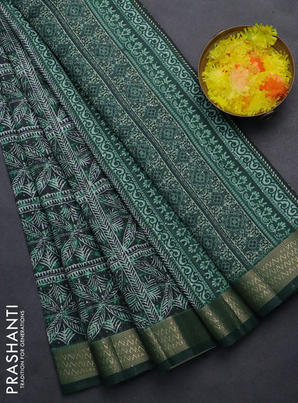 Semi tussar saree green with allover leaf prints & sequin work and zari woven border