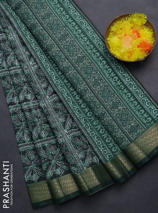 Semi tussar saree green with allover leaf prints & sequin work and zari woven border