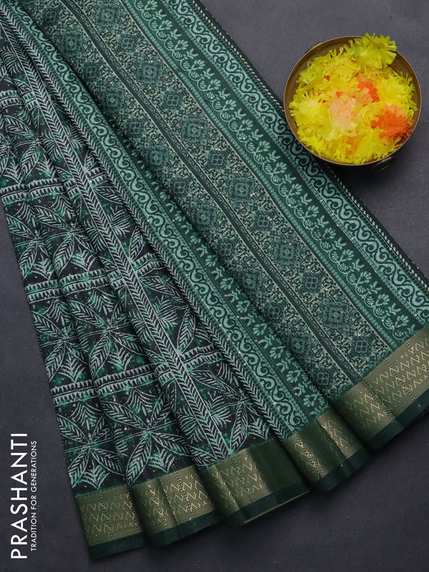 Semi tussar saree green with allover leaf prints & sequin work and zari woven border