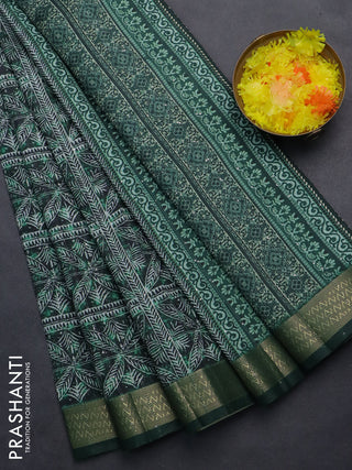 Semi tussar saree green with allover leaf prints & sequin work and zari woven border