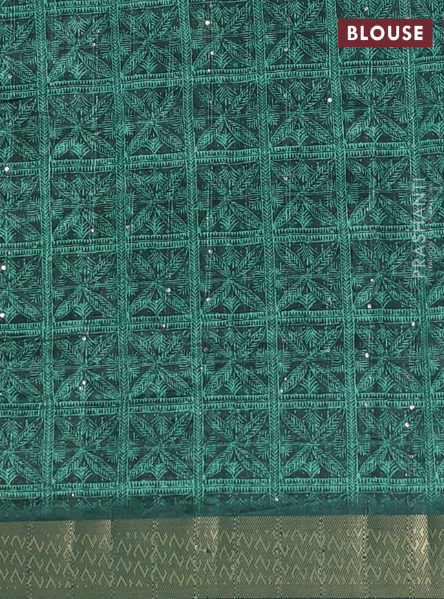 Semi tussar saree green with allover leaf prints & sequin work and zari woven border