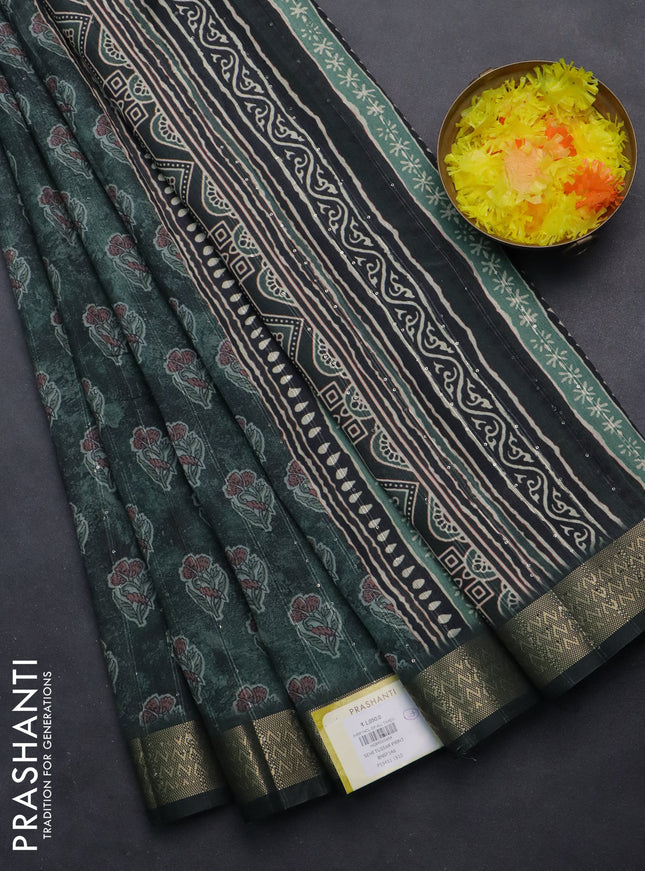 Semi tussar saree sap green with floral butta prints & sequin work and zari woven border