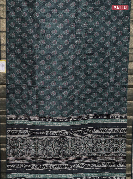 Semi tussar saree sap green with floral butta prints & sequin work and zari woven border