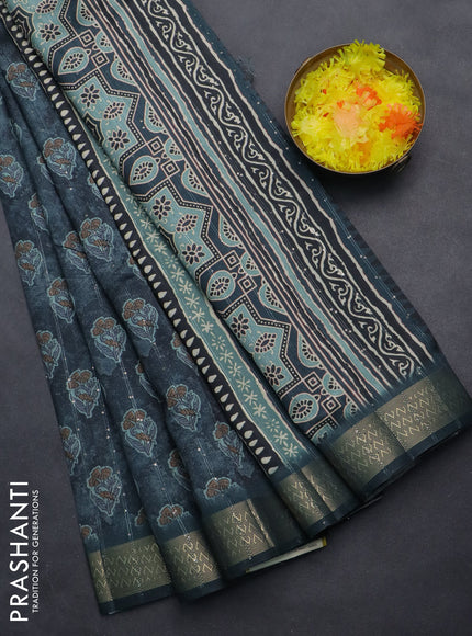 Semi tussar saree dark peacock green with floral butta prints & sequin work and zari woven border
