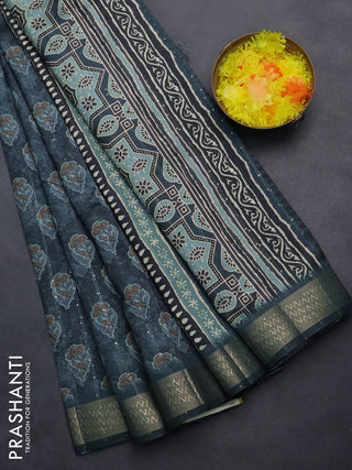 Semi tussar saree dark peacock green with floral butta prints & sequin work and zari woven border