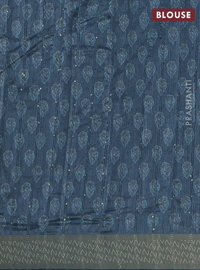 Semi tussar saree dark peacock green with floral butta prints & sequin work and zari woven border