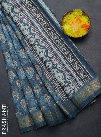 Semi tussar saree blue shade with floral butta prints & sequin work and zari woven border
