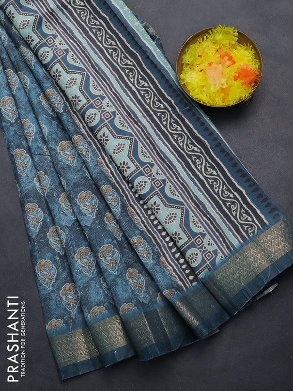 Semi tussar saree blue shade with floral butta prints & sequin work and zari woven border