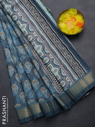 Semi tussar saree blue shade with floral butta prints & sequin work and zari woven border