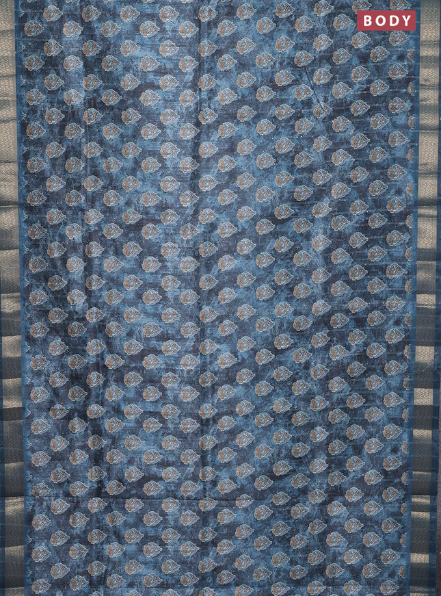Semi tussar saree blue shade with floral butta prints & sequin work and zari woven border