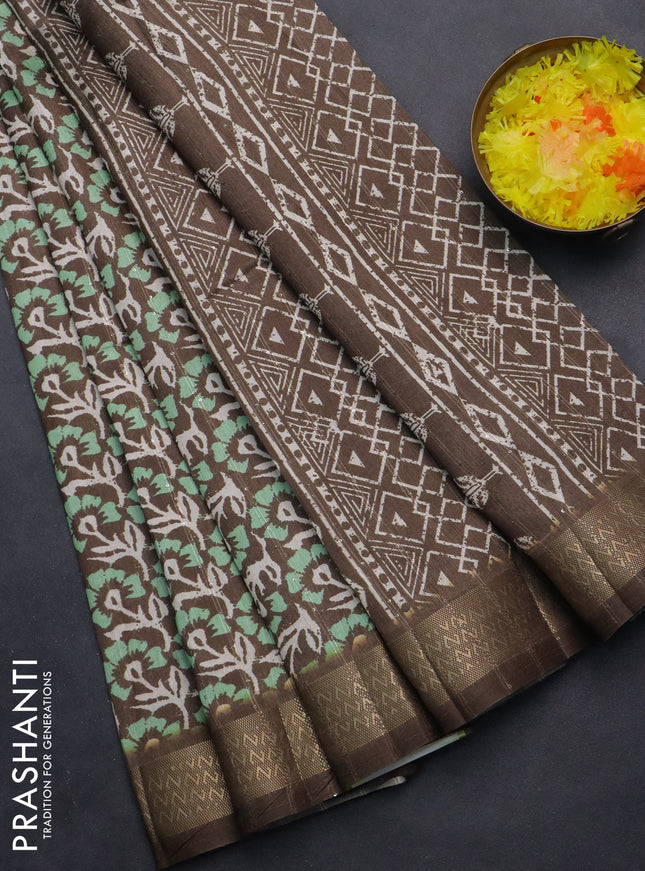 Semi tussar saree brown with allover floral prints & sequin work and zari woven border