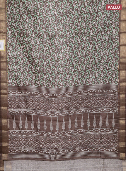 Semi tussar saree brown with allover floral prints & sequin work and zari woven border