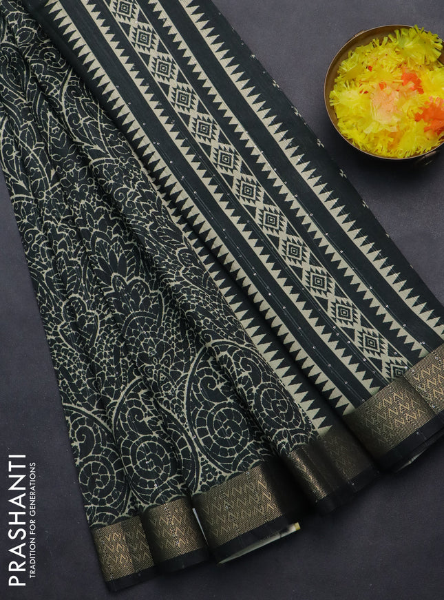 Semi tussar saree dark bottle green with allover prints & sequin work and zari woven border
