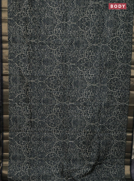 Semi tussar saree dark bottle green with allover prints & sequin work and zari woven border