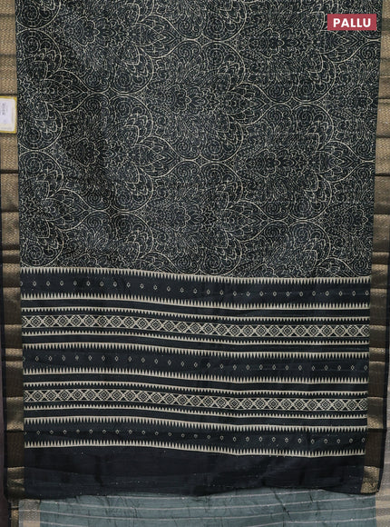 Semi tussar saree dark bottle green with allover prints & sequin work and zari woven border