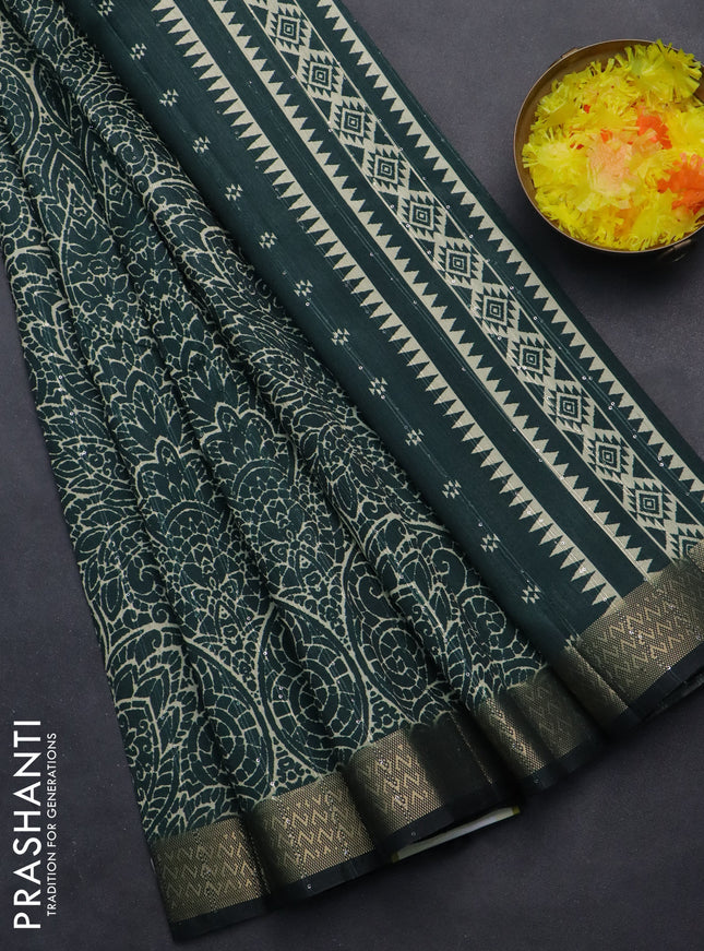 Semi tussar saree green with allover prints & sequin work and zari woven border