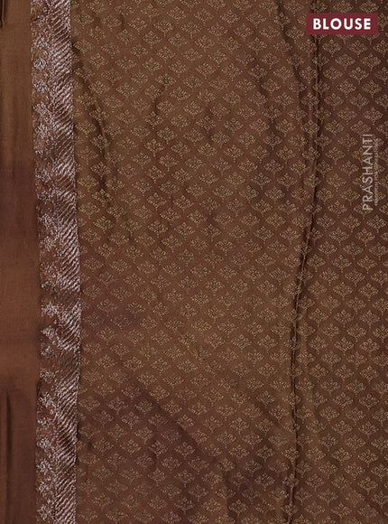 Banarasi semi crepe saree briown with allover thread & zari woven brocade weaves and woven border