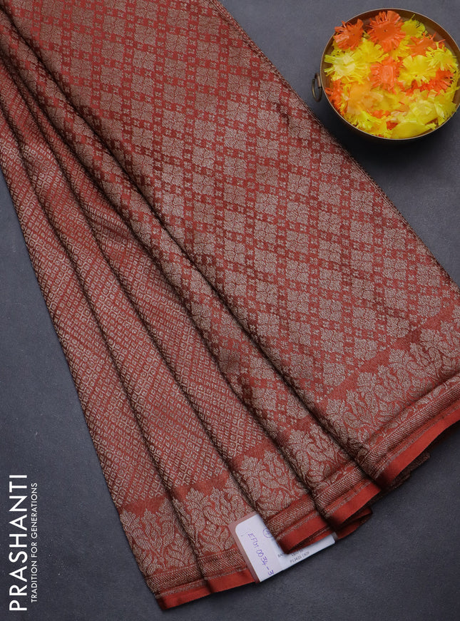 Banarasi semi crepe saree rust shade with allover thread & zari woven brocade weaves and woven border
