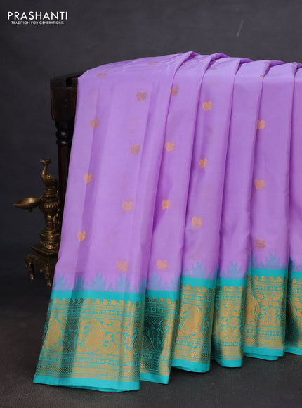 Pure gadwal silk saree lavender and teal blue with annam zari woven buttas and temple design zari woven border
