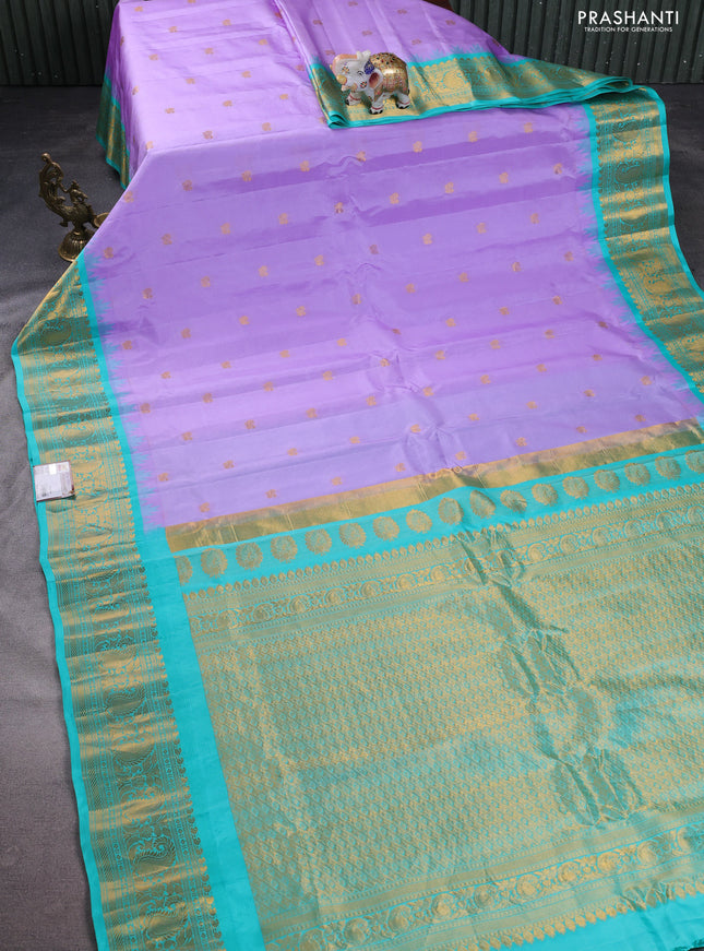 Pure gadwal silk saree lavender and teal blue with annam zari woven buttas and temple design zari woven border